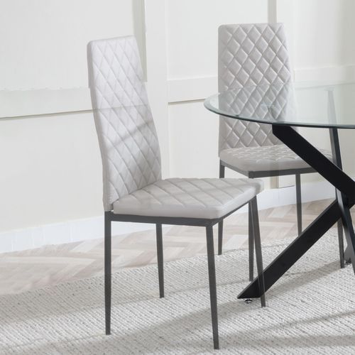 Clearance - Metro Dining Chairs in Beige Colour Leather and Black Metal Legs