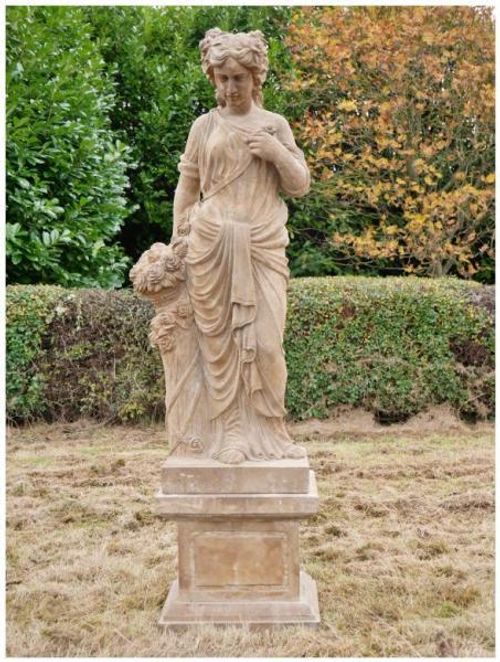 Hand Carved Stone Lady with Flowers Statue