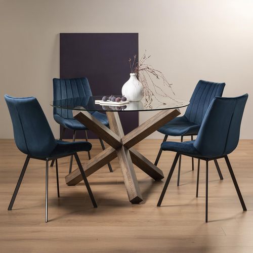 Bentley Designs Turin Glass 4 Seater Round Dining Table Dark Oak Legs with 4 Fontana Blue Velvet Chairs