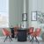 Bern Fluted Black 4 Seater Round Dining Set - 4 Ion Orange Velvet Fabric Swivel Dining Chair