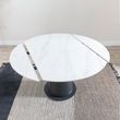 Carrara 4-6 Seater White Ceramic Round Swivel Motion Extending Dining Table with Black Pedestal Base - 135cm
