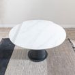 Carrara 4-6 Seater White Ceramic Round Swivel Motion Extending Dining Table with Black Pedestal Base - 135cm