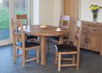 Hampshire Oak Round Extending Dining Table - 2-4 Seater - 107cm-145cm