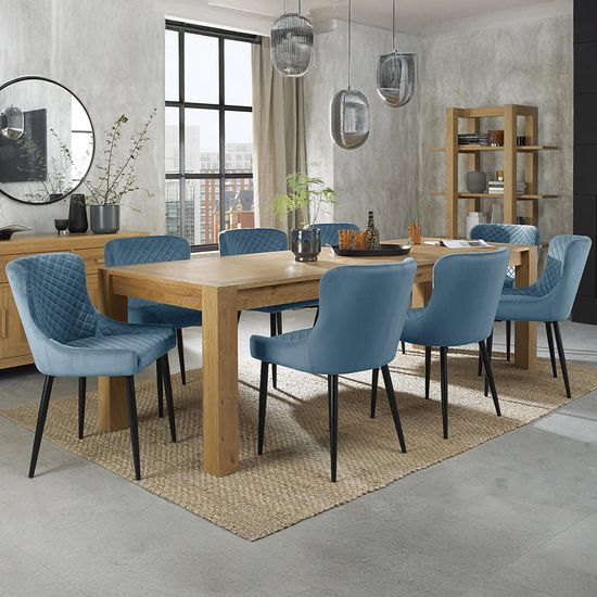 Bentley Designs Turin Light Oak 6-10 Seater Extending Dining Table with 8 Cezanne Petrol Blue Velvet Chairs - Black Legs