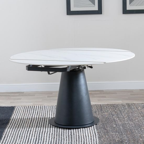 Carrara 4-6 Seater White Ceramic Round Swivel Motion Extending Dining Table with Black Pedestal Base - 135cm