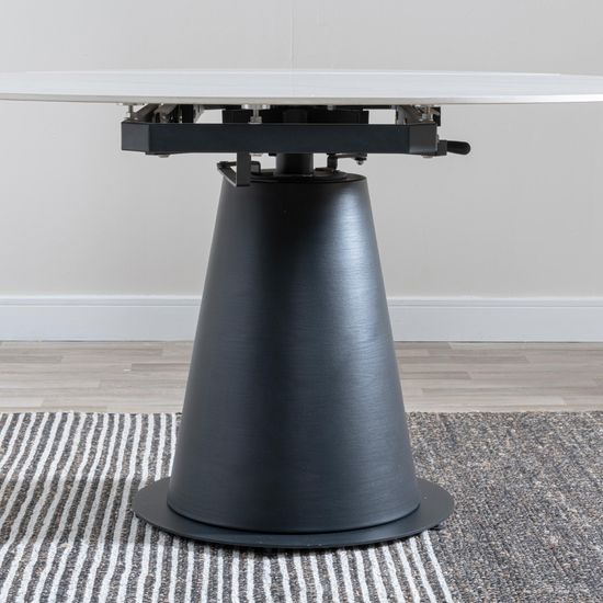 Carrara 4-6 Seater White Ceramic Round Swivel Motion Extending Dining Table with Black Pedestal Base - 135cm
