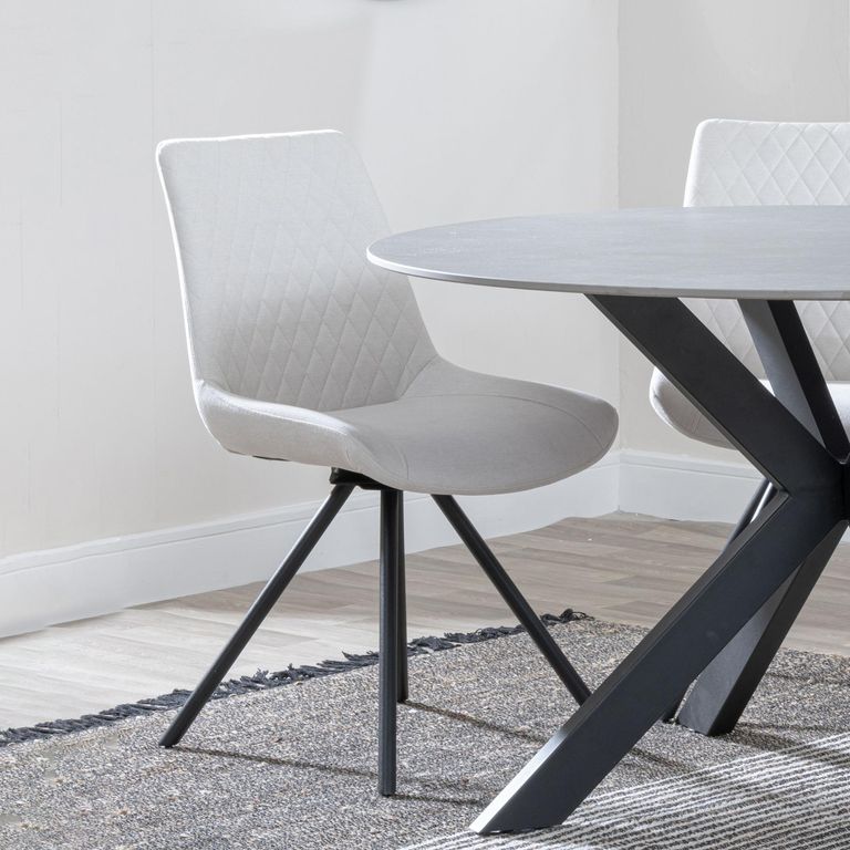 Carrara White Ceramic 4 Seater Round Extending Dining Set - 4 Boden Cream Fabric Swivel Dining Chair