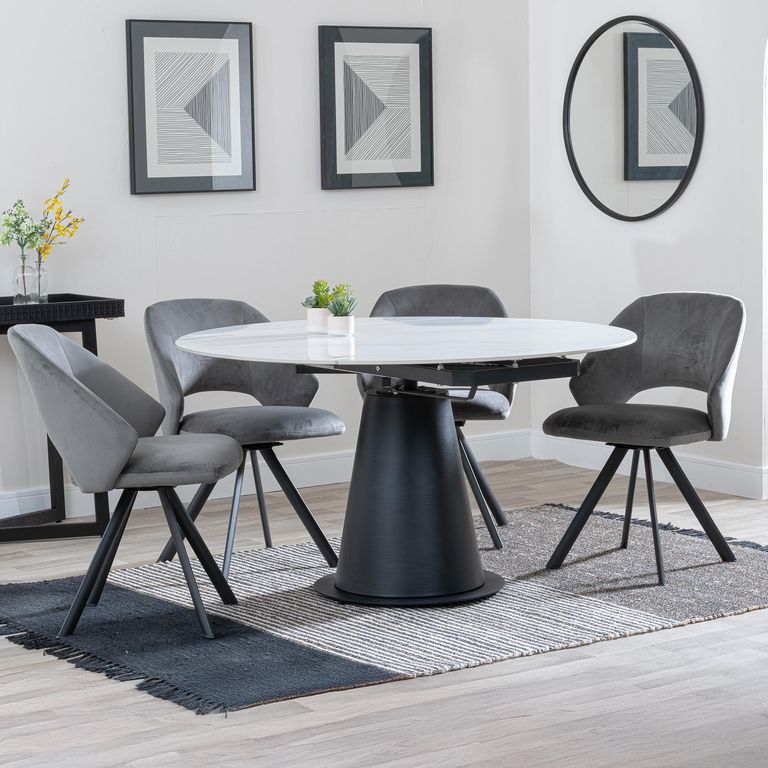 Carrara White Ceramic 4 Seater Round Extending Dining Set - 4 Ion Dark Grey Velvet Fabric Swivel Dining Chair