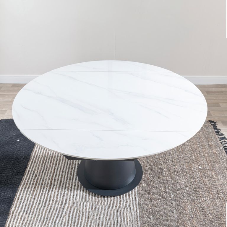 Carrara 4-6 Seater White Ceramic Round Swivel Motion Extending Dining Table with Black Pedestal Base - 135cm