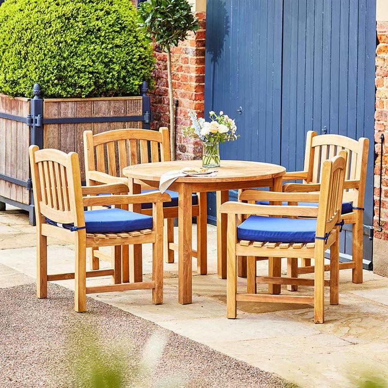 Churn Outdoor Teak Table 120cm and 4 Malvern Carver Chairs
