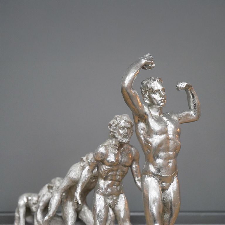 Silver Human Evolution Statue - Set of 2 - Resin