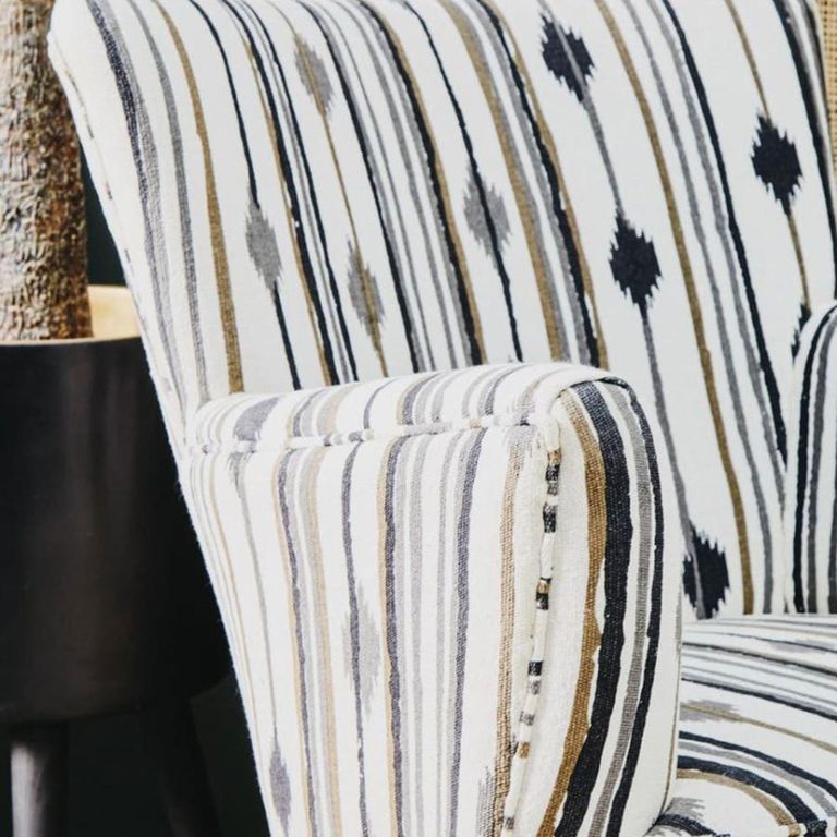 Cefena Armchair - White and Black Fabric with Flared Arms