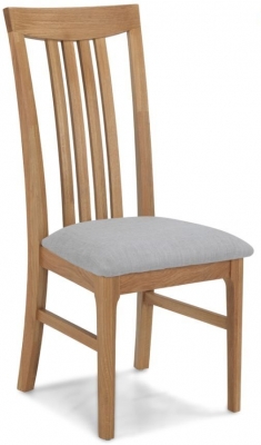 Product photograph of Wadsworth Waxed Oak Slatted Back Dining Chair Upholstered Padded Seat Sold In Pairs from Choice Furniture Superstore