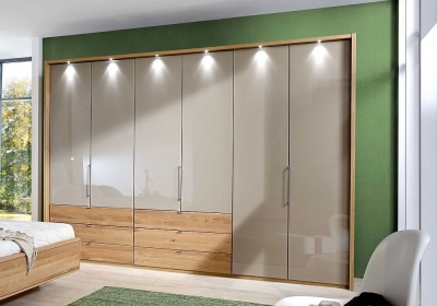 Product photograph of Wiemann Serena 250cm Oak And Champagne Glass 6 Door Bi Fold Wardrobe With Lh Drawers from Choice Furniture Superstore