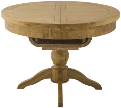 Product photograph of Portland Oak 2-4 Seater Round Pedestal Butterfly Extending Dining Table from Choice Furniture Superstore