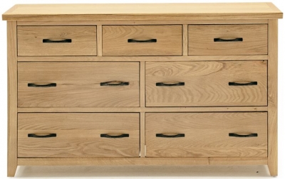 Product photograph of Vida Living Ramore Oak 7 Drawer Dresser Chest from Choice Furniture Superstore