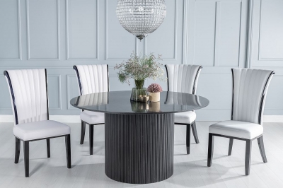 Product photograph of Carra Marble Dining Table Black Round Top And Fluted Ribbed Drum Base With Cadiz White Faux Leather Chairs from Choice Furniture Superstore
