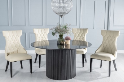 Product photograph of Carra Marble Dining Table Black Round Top And Fluted Ribbed Drum Base With Mimi Cream Faux Leather Chairs from Choice Furniture Superstore