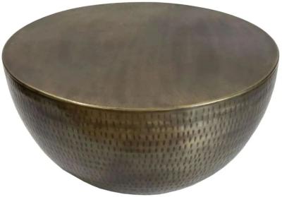 Product photograph of Agra Hammered Antique Brass Coffee Table - Metal Round Base from Choice Furniture Superstore