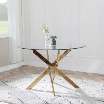 Product photograph of Chopstick Clear Glass 4 Seater Round Dining Table With Gold Metal Chopstick Legs from Choice Furniture Superstore