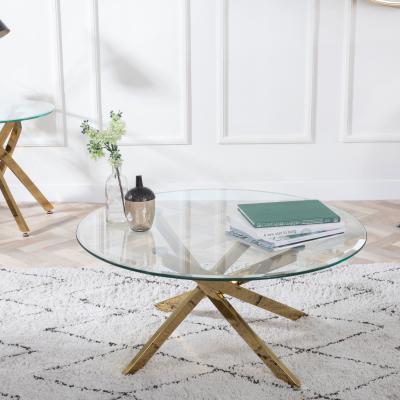 Product photograph of Chopstick Clear Glass Round Coffee Table With Gold Metal Chopstick Legs from Choice Furniture Superstore