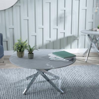 Product photograph of Chopstick Grey Glass Round Coffee Table With Chrome Metal Chopstick Legs from Choice Furniture Superstore