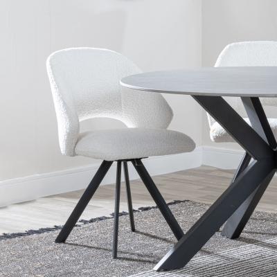 Product photograph of Ion Cream Boucle Teddy Fabric Swivel Dining Chair With Black Legs from Choice Furniture Superstore