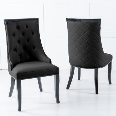 Product photograph of Carmela Black Leather Large High Back Dining Chair With Black Legs from Choice Furniture Superstore