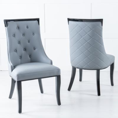 Product photograph of Carmela Grey Leather Large High Back Dining Chair With Black Legs from Choice Furniture Superstore