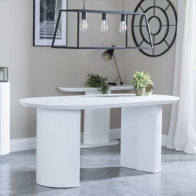 Product photograph of Luxor 6 Seater White Marble Effect Oval Dining Table - Fluted Base from Choice Furniture Superstore