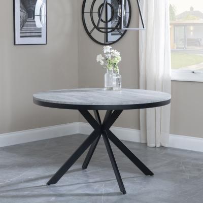 Product photograph of Ezra Grey Concrete Effect 4 Seater Round Dining Table With Black Spider Legs from Choice Furniture Superstore
