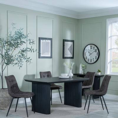 Product photograph of Bern Fluted Black Dining Set - Corona Grey Fabric Chairs from Choice Furniture Superstore