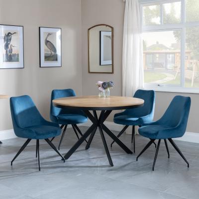 Bronx Industrial Oak Effect 4 Seater Round Dining Set With Spider Legs 4 Arctic Blue Velvet Fabric Swivel Dining Chair