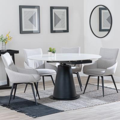 Carrara White Ceramic 4 Seater Round Extending Dining Set 4 Ace Beige Fabric Swivel Dining Chair