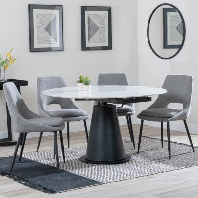 Carrara White Ceramic 4 Seater Round Extending Dining Set 4 Peyton Grey Fabric Dining Chair