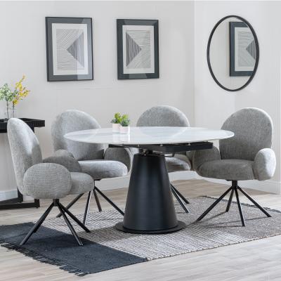 Carrara White Ceramic 4 Seater Round Extending Dining Set 4 Theo Dark Grey Fabric Swivel Dining Chair