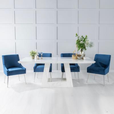 Product photograph of Milan White Marble Dining Set - Giovanni Blue Fabric Chairs from Choice Furniture Superstore