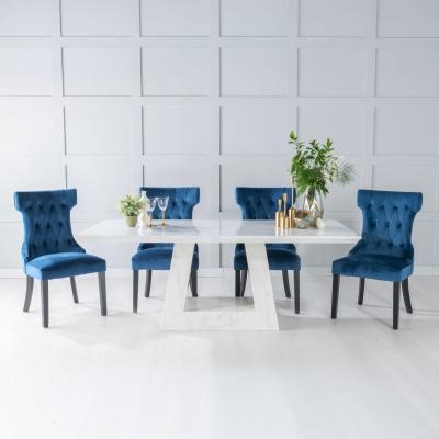 Product photograph of Milan White Marble Dining Set - Courtney Blue Fabric Chairs from Choice Furniture Superstore