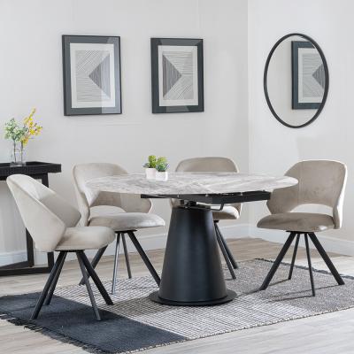 Carrara Grey Ceramic 4 Seater Round Extending Dining Set 4 Ion Beige Velvet Fabric Swivel Dining Chair