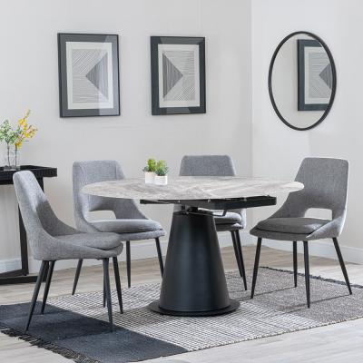 Carrara Grey Ceramic 4 Seater Round Extending Dining Set 4 Peyton Grey Fabric Dining Chair