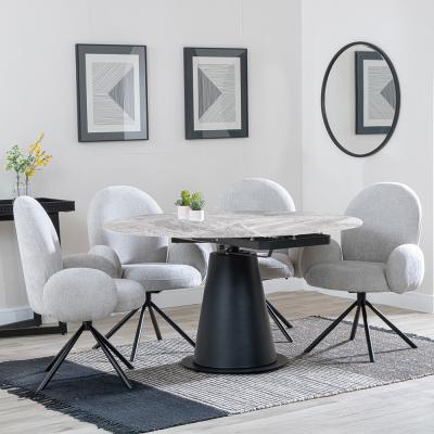 Carrara Grey Ceramic 4 Seater Round Extending Dining Set 4 Theo Grey Fabric Swivel Dining Chair