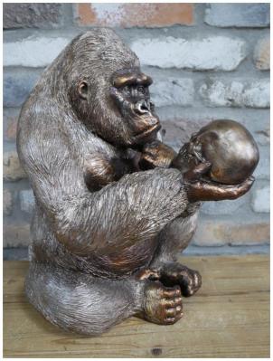 Product photograph of Large Gorilla Statue Holding Skull Ornament from Choice Furniture Superstore