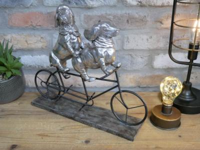 Product photograph of Resin And Metal Dogs On A Bicycle - Set Of 2 from Choice Furniture Superstore