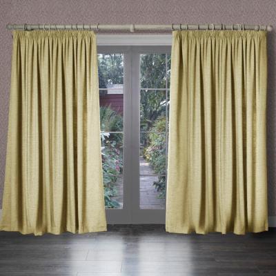 Product photograph of Voyage Maison Helmsley Lemon Woven Pencil Pleat Curtains from Choice Furniture Superstore