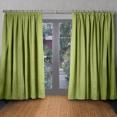 Product photograph of Voyage Maison Malleny Kiwi Woven Pencil Pleat Curtains from Choice Furniture Superstore