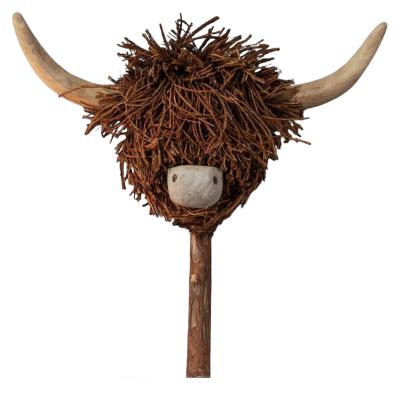 Product photograph of Voyage Maison Hewie Brown Highland Cow Hand Crafted Wooden Sculpture from Choice Furniture Superstore