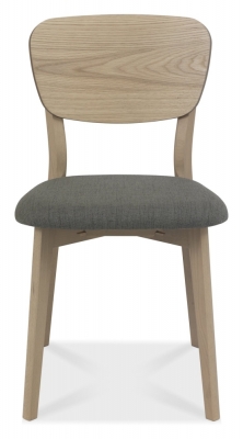 Product photograph of Bentley Designs Dansk Scandi Oak Veneer Cold Steel Fabric Back Dining Chair Sold In Pairs from Choice Furniture Superstore