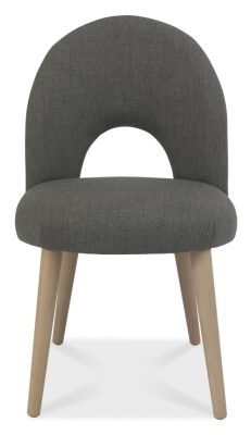 Product photograph of Bentley Designs Dansk Scandi Oak Upholstered Cold Steel Fabric Dining Chair Sold In Pairs from Choice Furniture Superstore