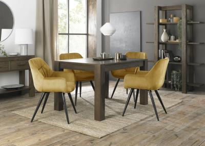 Product photograph of Bentley Designs Turin Dark Oak 4-6 Seater Extending Dining Table With 4 Dali Mustard Velvet Chairs from Choice Furniture Superstore
