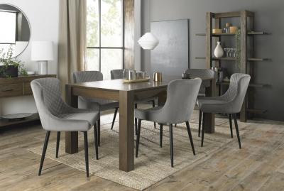 Product photograph of Bentley Designs Turin Dark Oak 6-10 Seater Extending Dining Table With 8 Cezanne Grey Velvet Chairs - Black Legs from Choice Furniture Superstore